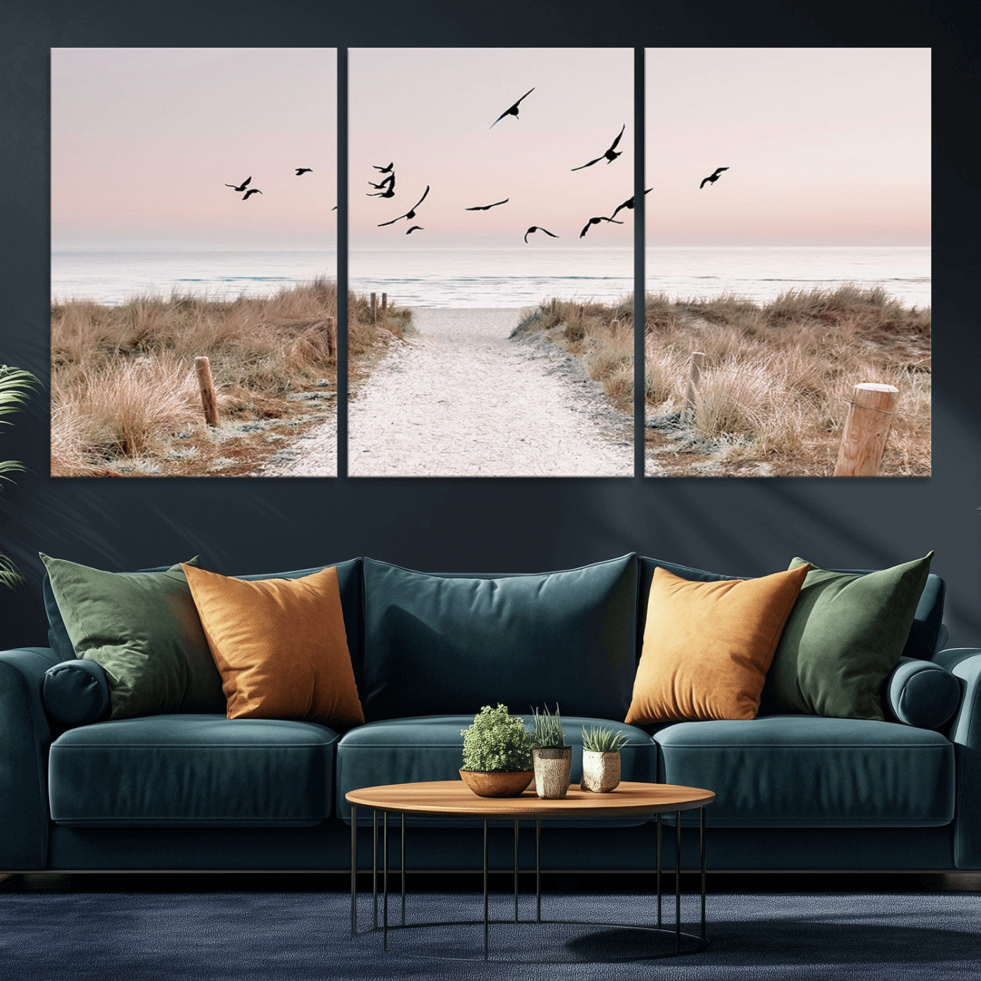 A peaceful coastal pathway leading to the ocean, with birds flying across a soft pastel sky, creating a calm and scenic beach atmosphere.