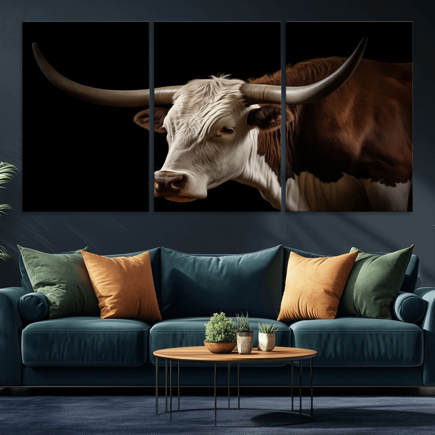"Close-up of a brown and white longhorn cow with prominent curved horns against a black background."