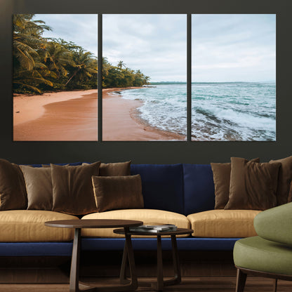 Framed canvas of a tropical beach with palm trees and soft waves, ideal for coastal escape or serene nature-inspired home decor.
