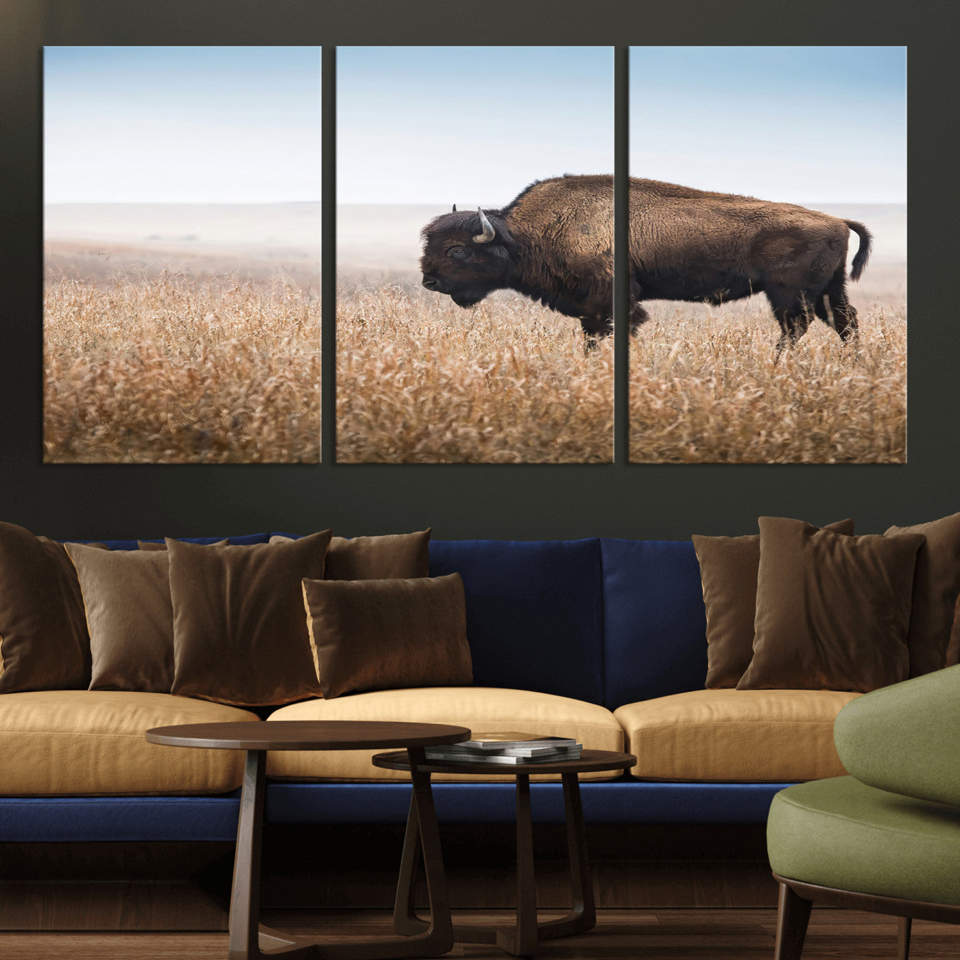 A majestic bison standing in an open prairie field, its strong form blending into the golden grass under a vast blue sky, evoking the wild spirit of the American plains.