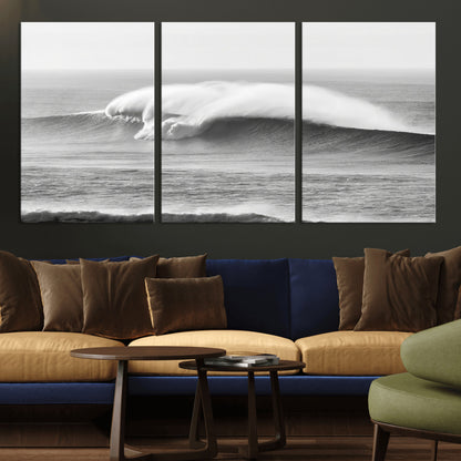 A dramatic black and white ocean wave crashing with immense force, capturing the raw power and movement of the sea in a bold seascape.