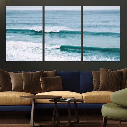 Powerful ocean waves rolling towards the shore, their turquoise hues blending with white sea foam under an open horizon, capturing the essence of the ocean's movement.