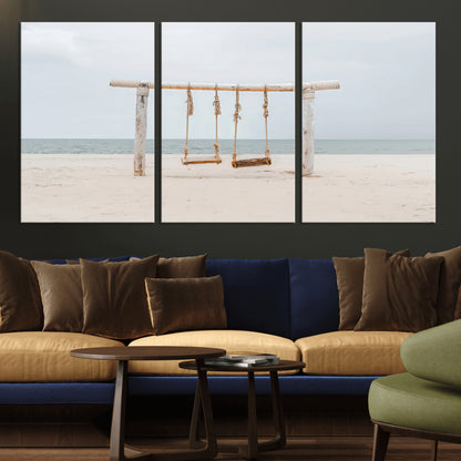 A rustic wooden beach swing stands on a serene sandy shore with an ocean horizon in the background, creating a tranquil and dreamy coastal escape.
