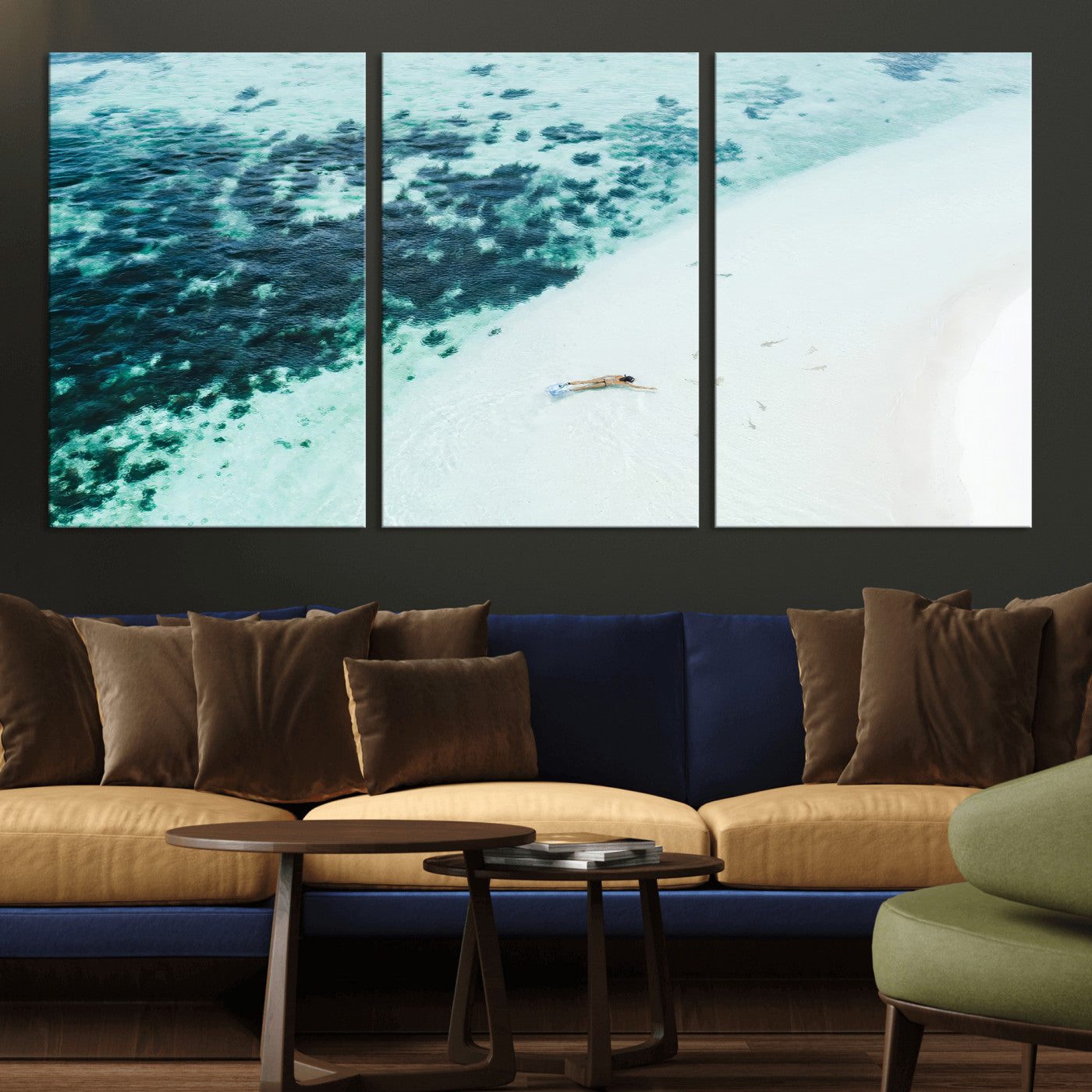 Canvas featuring an aerial view of a swimmer in shallow turquoise waters with coral patterns, ideal for tropical coastal home decor.