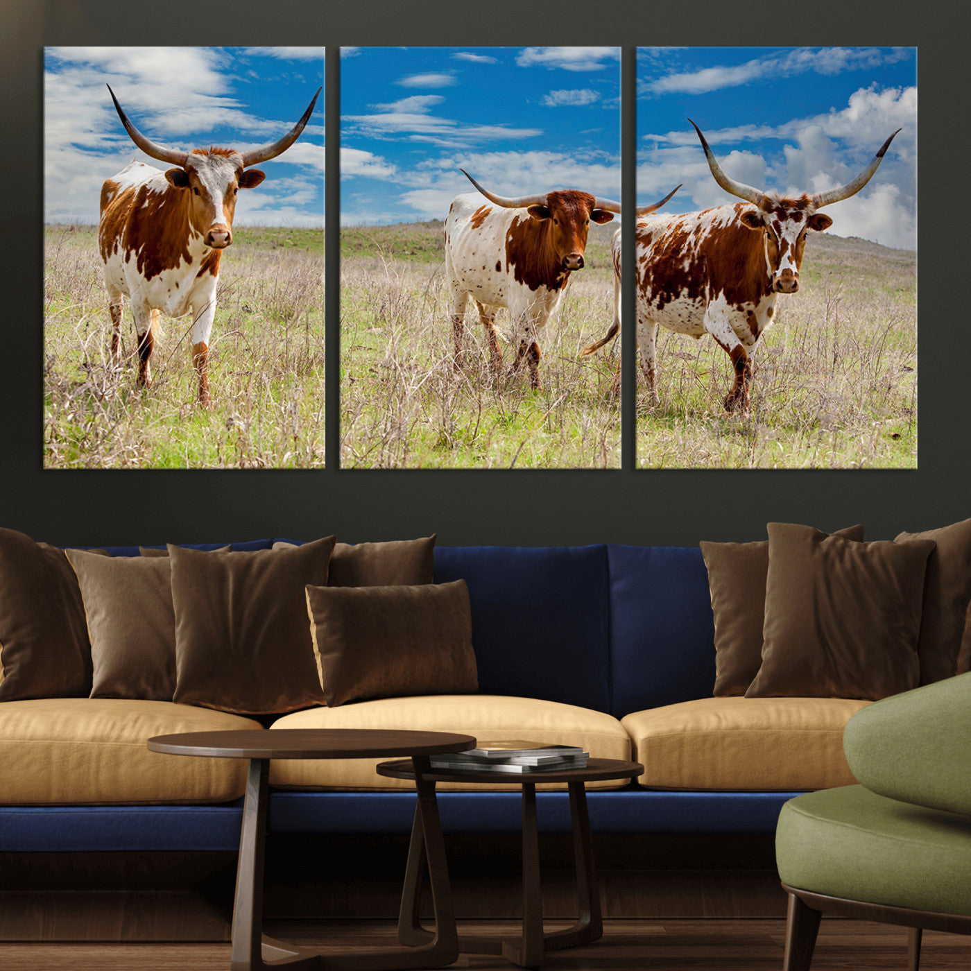 Three Texas longhorn cattle standing in dry grass under a bright blue sky, ideal for farmhouse or western rustic home decor.