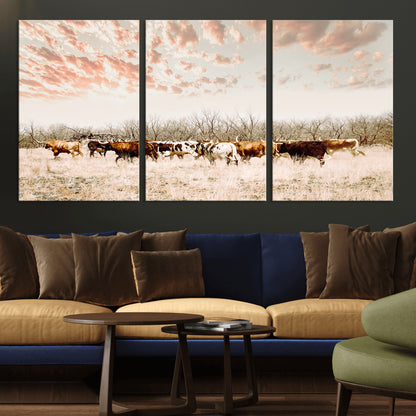 Cattle herd in a soft-toned field under a pastel pink sky, creating a peaceful rustic feel, perfect for farmhouse or western-themed spaces.