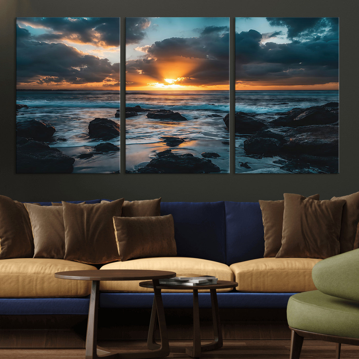 An awe-inspiring sunset over the ocean with rays of light piercing through dramatic clouds, creating a beautiful seascape with rocks in the foreground.