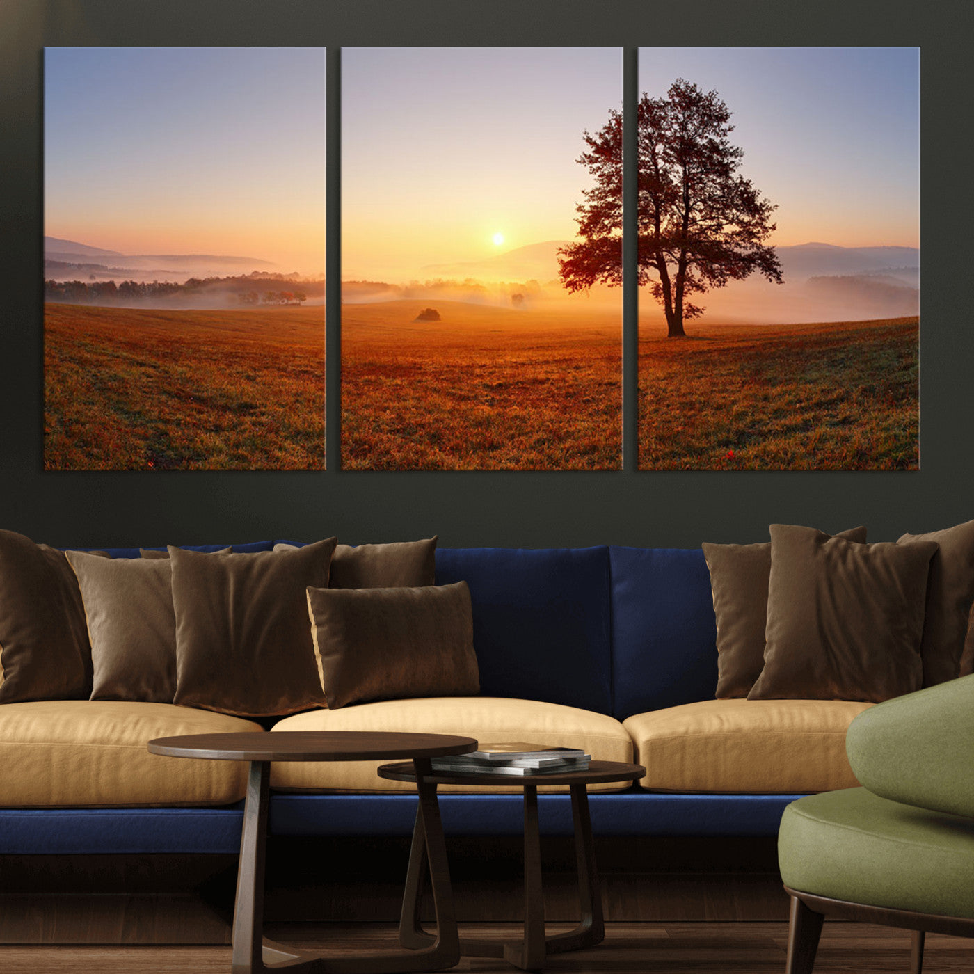 A tranquil landscape at sunrise with a mist-covered field and a lone tree, creating a peaceful and natural atmosphere.