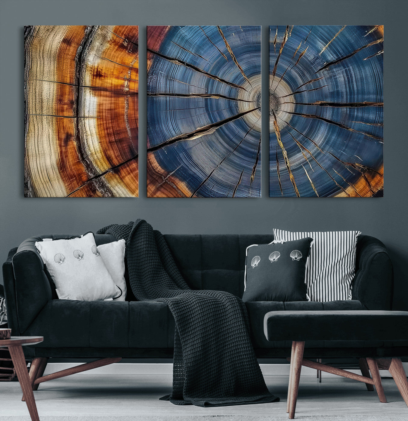 A stunning close-up view of a tree trunk, showcasing the intricate growth rings in a vibrant mix of warm browns, cool blues, and hints of natural texture.