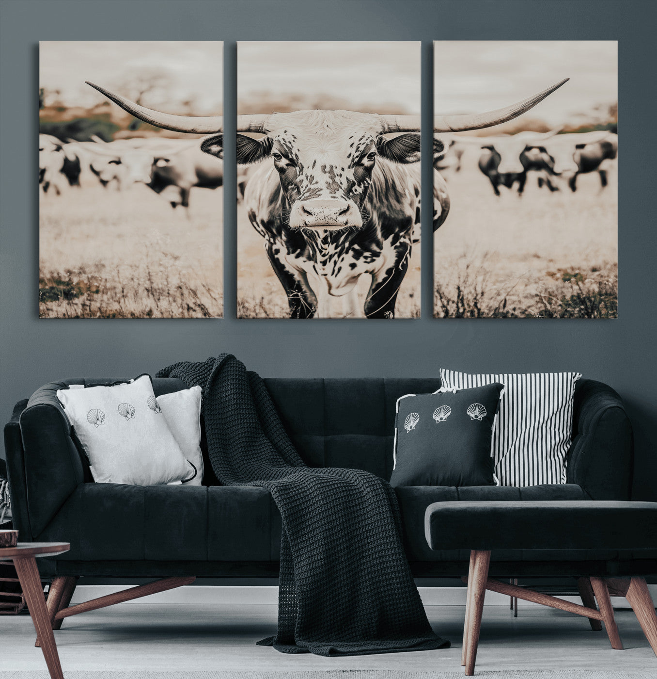 Canvas of a speckled Texas longhorn standing boldly in a field with a herd behind, perfect for rustic western or farmhouse wall decor.