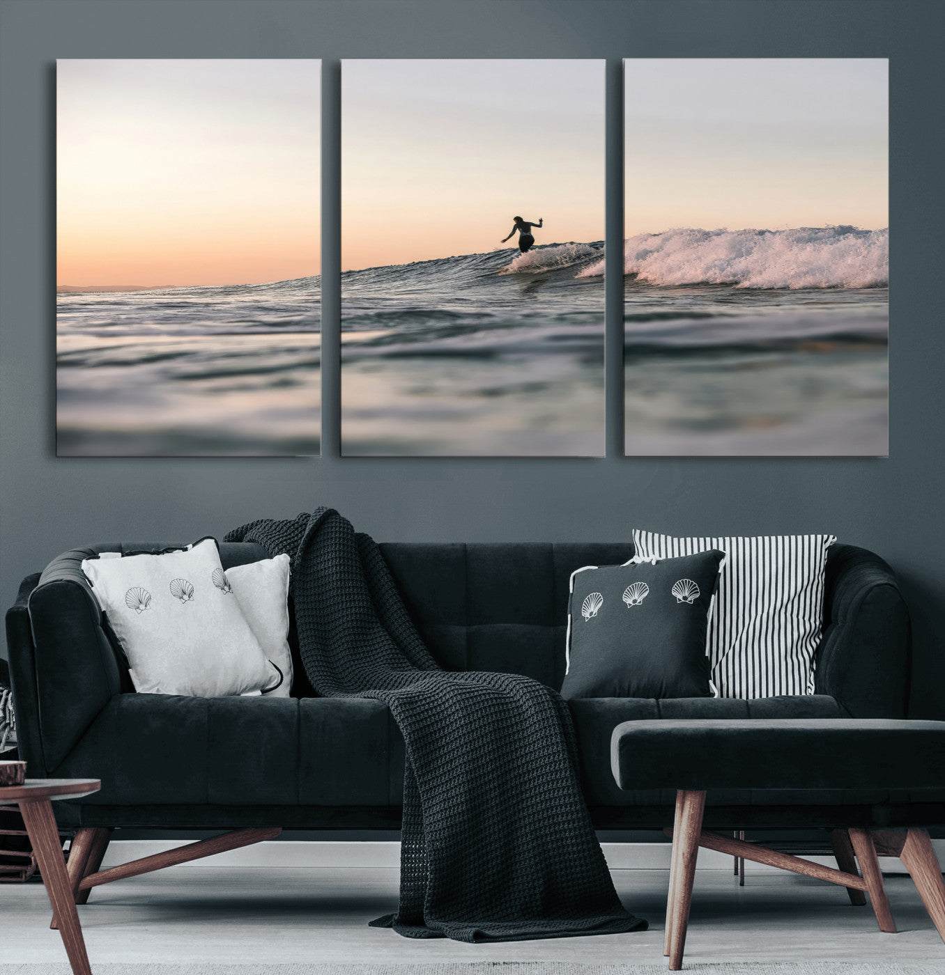 Framed canvas of a female surfer balancing on a wave at sunset, perfect for serene surf or ocean-inspired coastal decor.