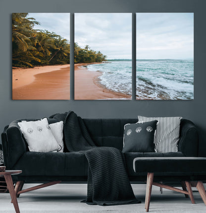 Framed canvas of a tropical beach with palm trees and soft waves, ideal for coastal escape or serene nature-inspired home decor.
