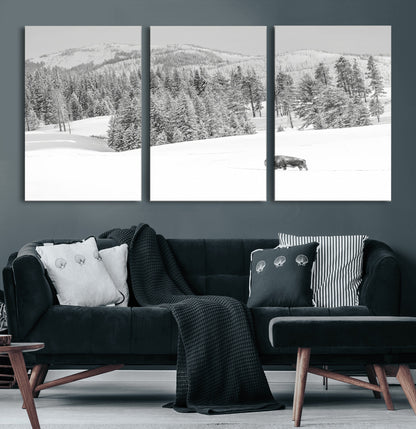 Snowy bison walking through white forest landscape, ideal for monochrome winter or wilderness-style interior wall decoration.