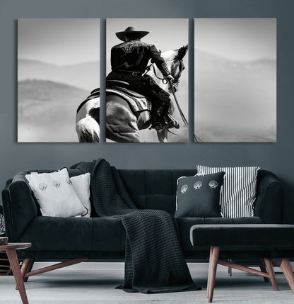 Black and white canvas of a cowboy on horseback with moody tones, perfect for rustic western or country-inspired home decor.