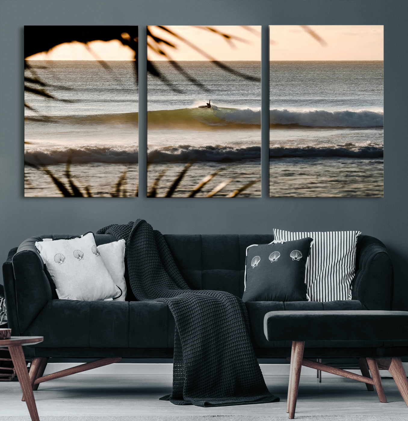 Photo of a surfer riding a golden hour wave at sunset, with tropical tones and dreamy light, perfect for tropical boho or coastal home decor.