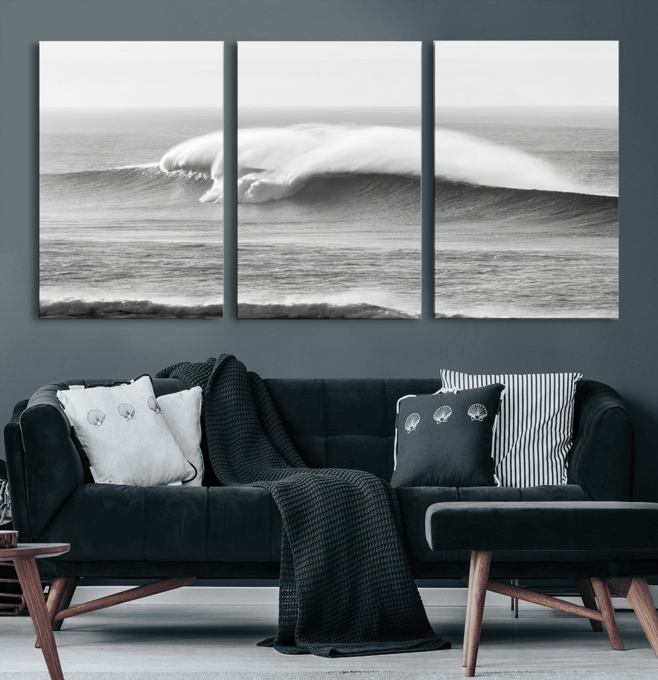 A dramatic black and white ocean wave crashing with immense force, capturing the raw power and movement of the sea in a bold seascape.