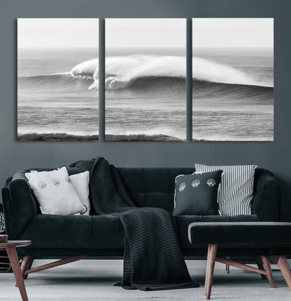A dramatic black and white ocean wave crashing with immense force, capturing the raw power and movement of the sea in a bold seascape.