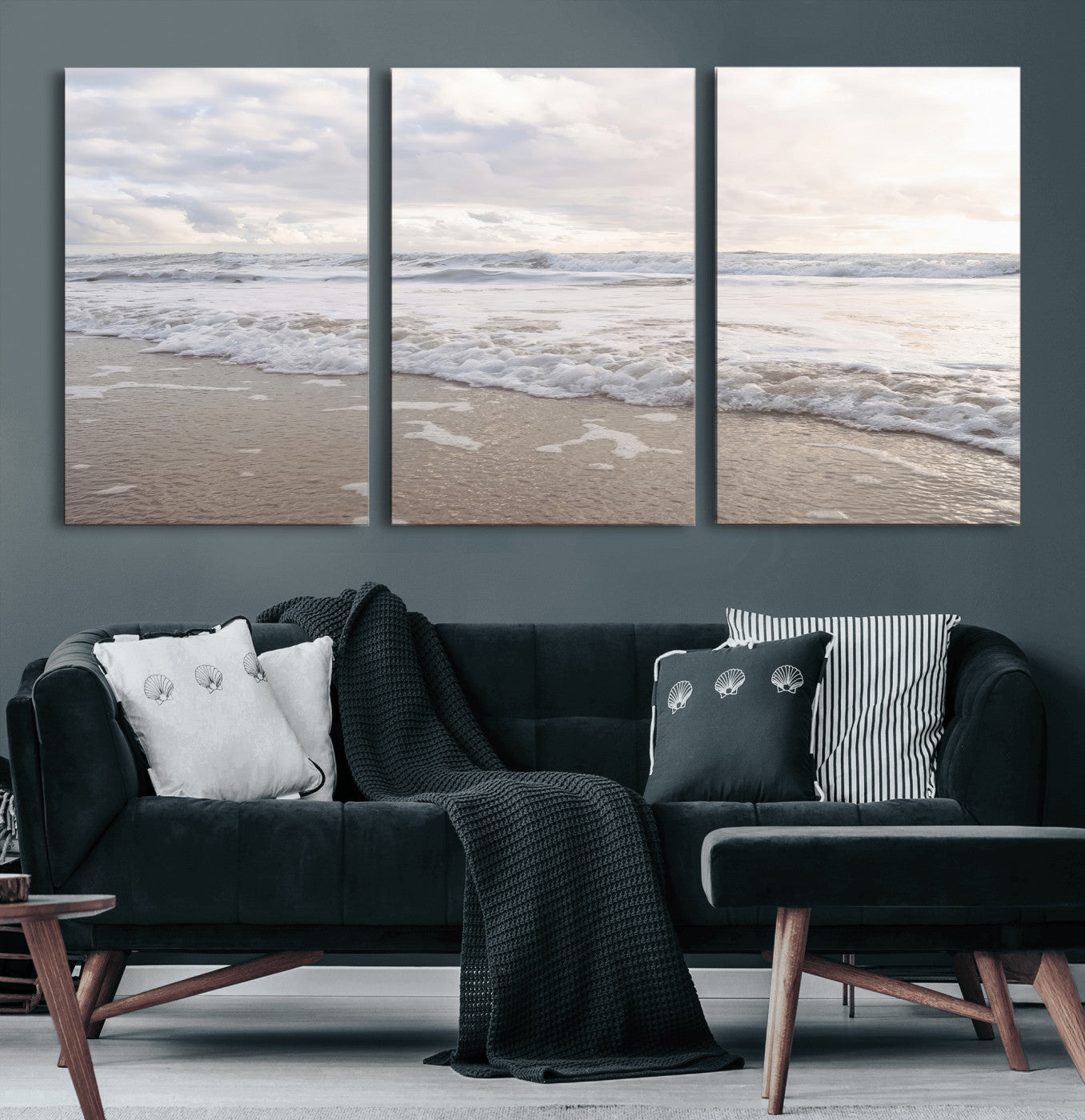 Peaceful ocean waves rolling onto the sandy shore under soft light, perfect for neutral or coastal minimalist decor themes.