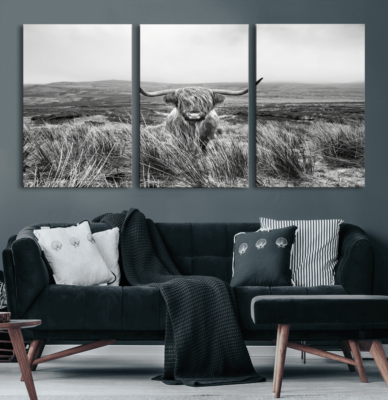 A black and white portrait of a Highland cow in a foggy Scottish countryside, capturing a rustic aesthetic and tranquil farm escape.