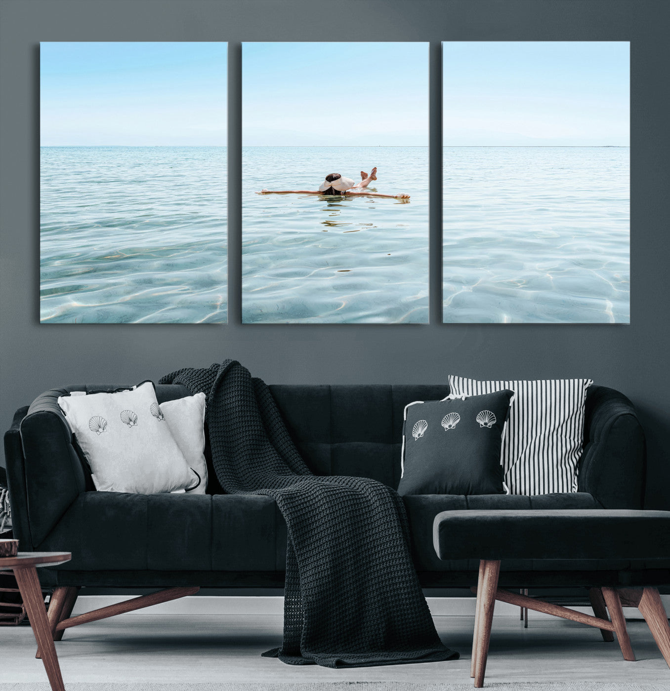 A peaceful minimalist scene of a person floating on crystal-clear water, surrounded by a vast open horizon, capturing relaxation and serenity in a tranquil aquatic setting.