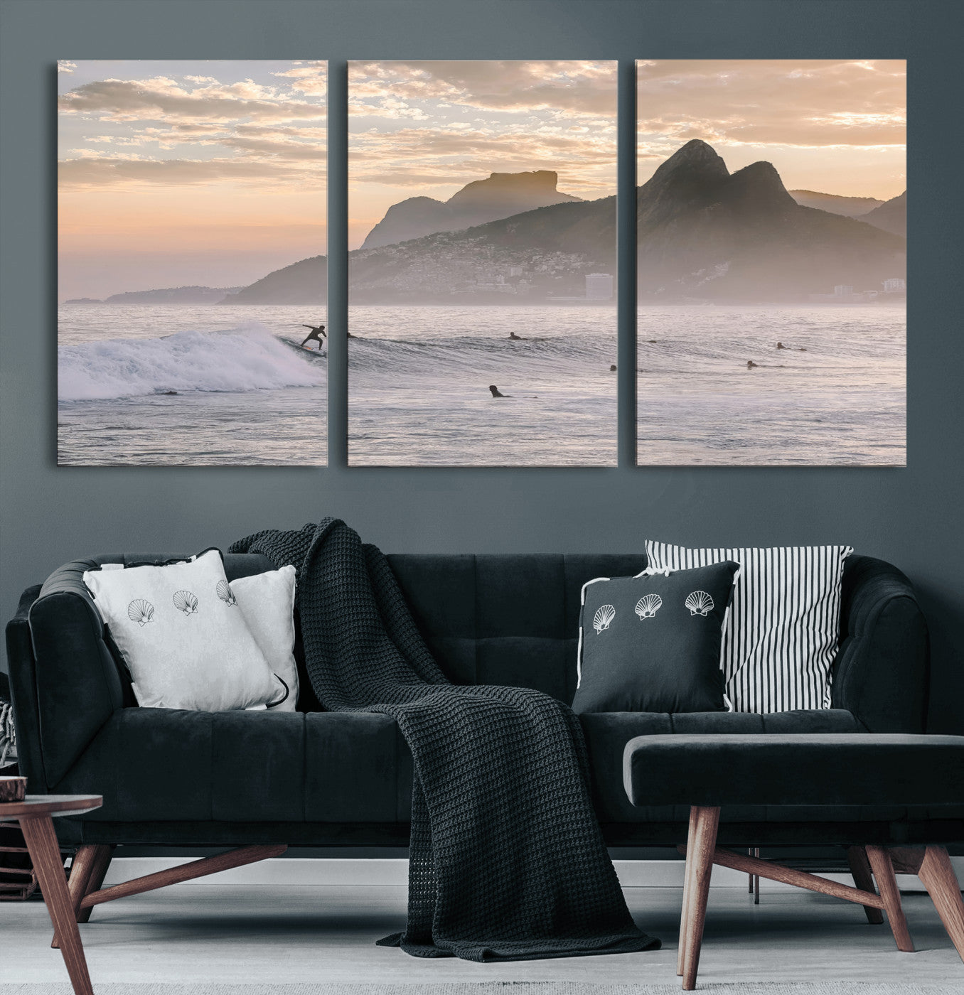 A surfer rides a golden hour wave near misty coastal mountains, surrounded by fellow surfers, capturing the spirit of a coastal adventure.