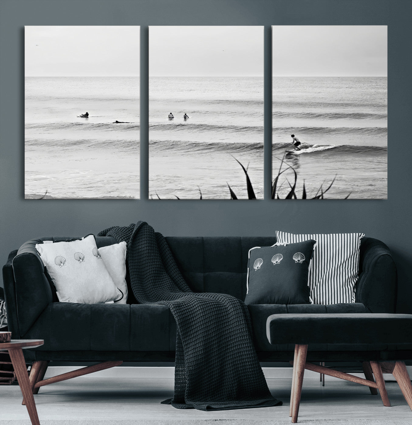 Monochrome canvas of surfers on calm ocean waves, ideal for minimalist coastal or beach-inspired interior decor.