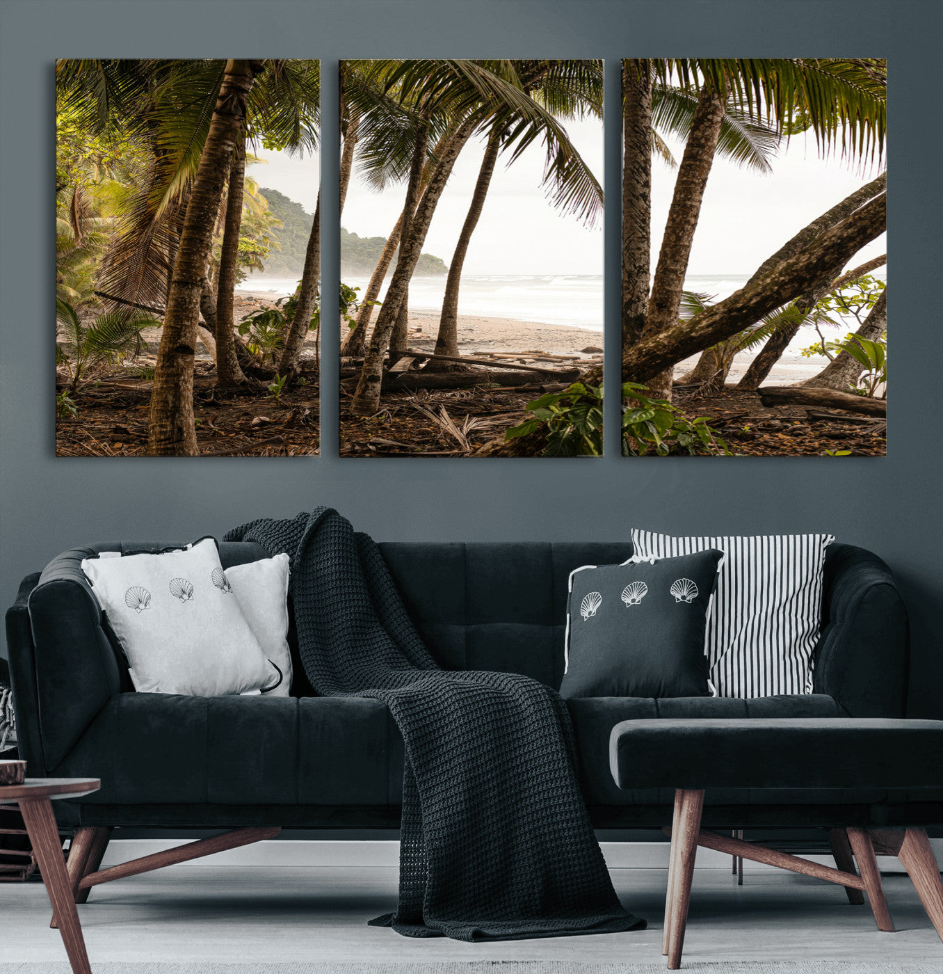 Dense tropical palm trees framing a sandy beach and ocean shore, ideal for jungle or coastal themed interior wall decor.