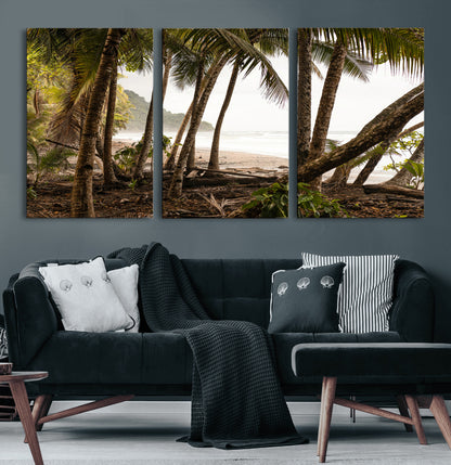 Dense tropical palm trees framing a sandy beach and ocean shore, ideal for jungle or coastal themed interior wall decor.