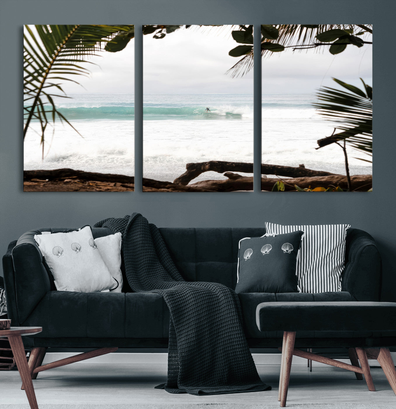 Tropical beach view with palm trees and surfer riding a wave, perfect for boho or coastal-inspired interior wall decor.