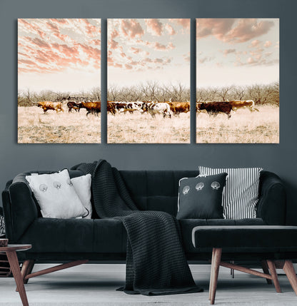 Cattle herd in a soft-toned field under a pastel pink sky, creating a peaceful rustic feel, perfect for farmhouse or western-themed spaces.