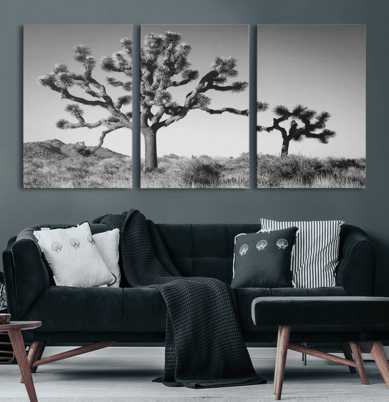 Black and white Joshua trees in a rugged desert landscape, creating a calm and minimalist feel for natural or rustic-themed interiors.