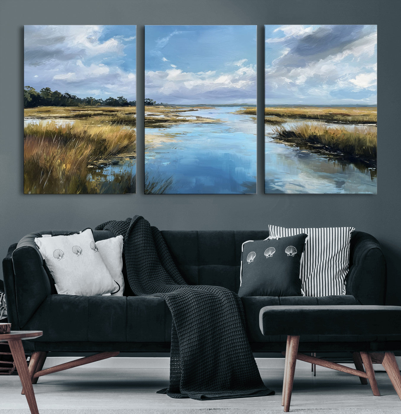 A beautiful, painterly landscape of a calm river winding through a marsh, with vibrant green grasses and a bright blue sky filled with fluffy clouds.
