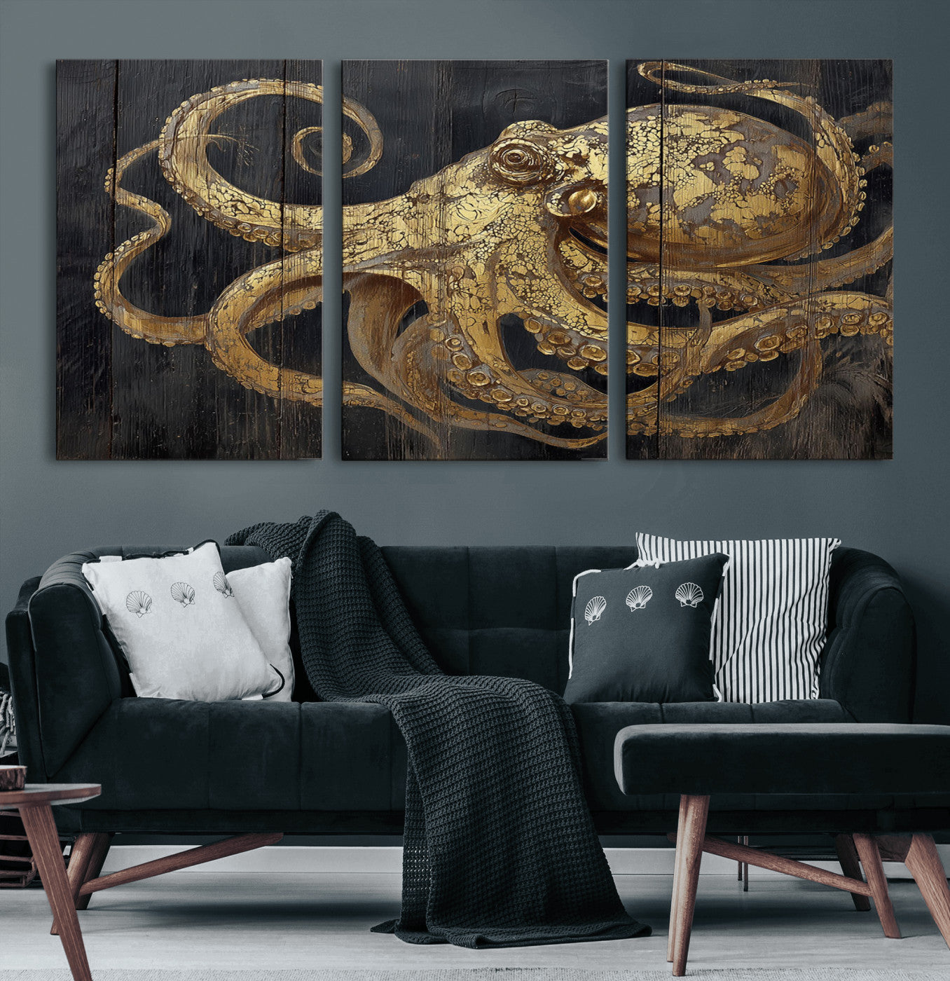 A detailed gold illustration of an octopus on black wooden planks, showing its intricate tentacles and textured skin in an artistic style.