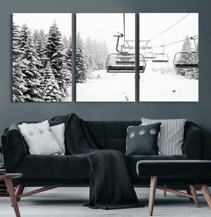 Black and white canvas of empty ski lifts over a snowy pine forest, perfect for minimal winter or ski lodge-inspired decor.