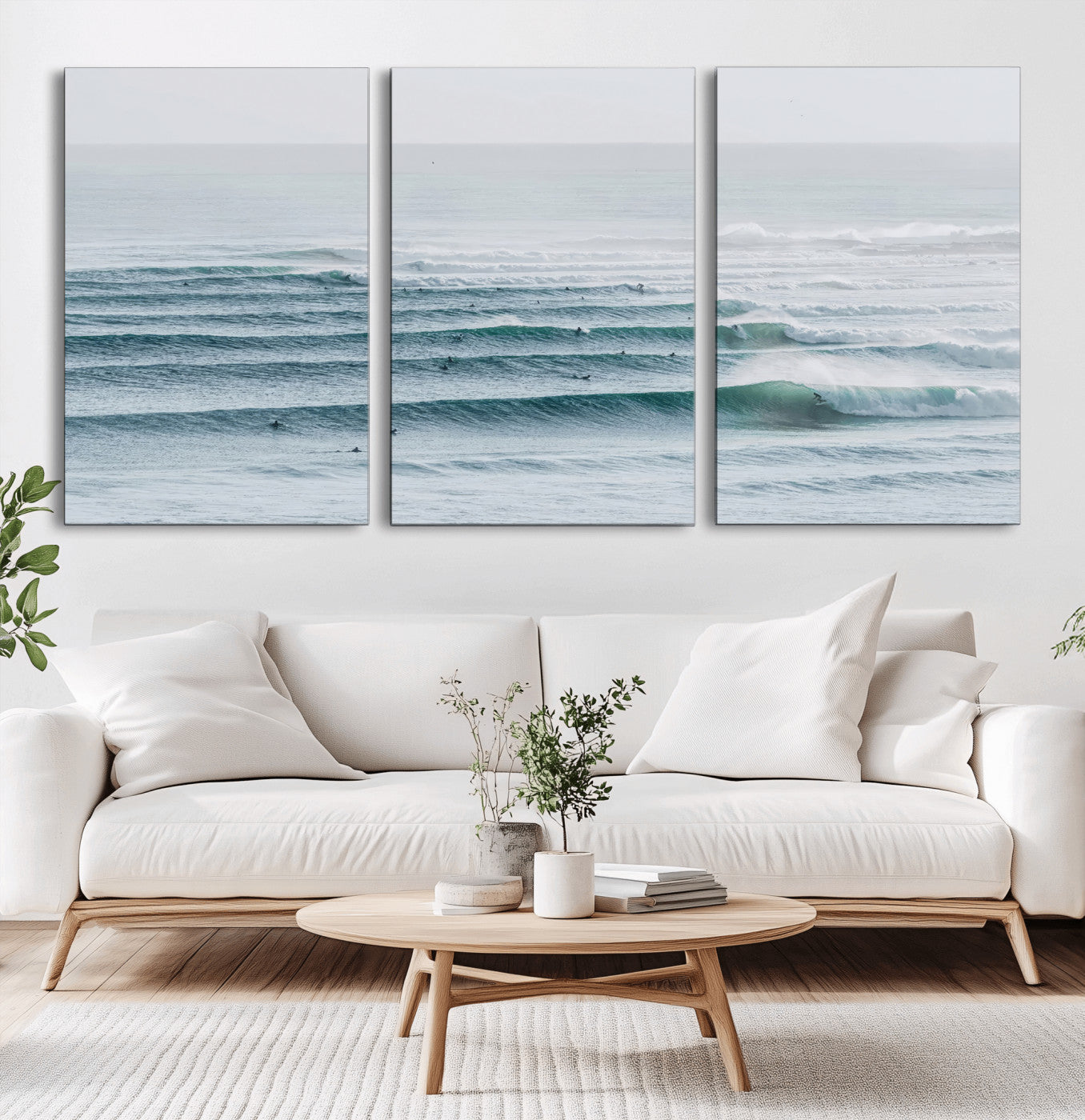 High-angle view of surfers lining up across layered ocean waves, ideal for minimal coastal or surf-inspired room decor.