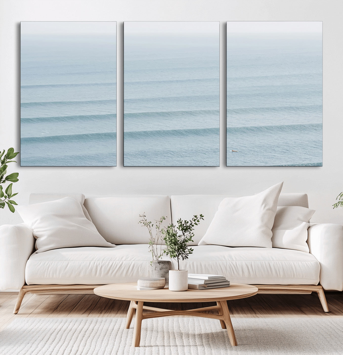 Framed canvas of repeating ocean waves with a distant solo surfer, ideal for minimalist ocean or calm coastal wall decor.
