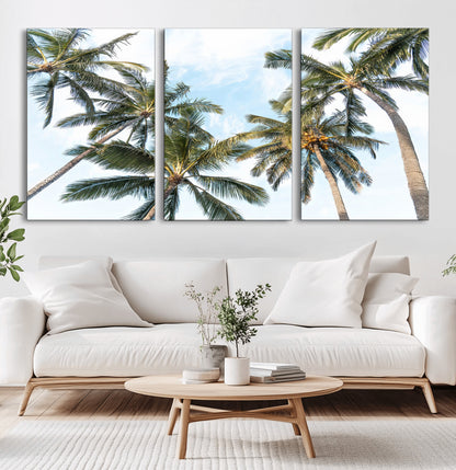 Framed canvas of tall palm trees reaching into a tropical sky, ideal for beach home or relaxed island-inspired wall decor.