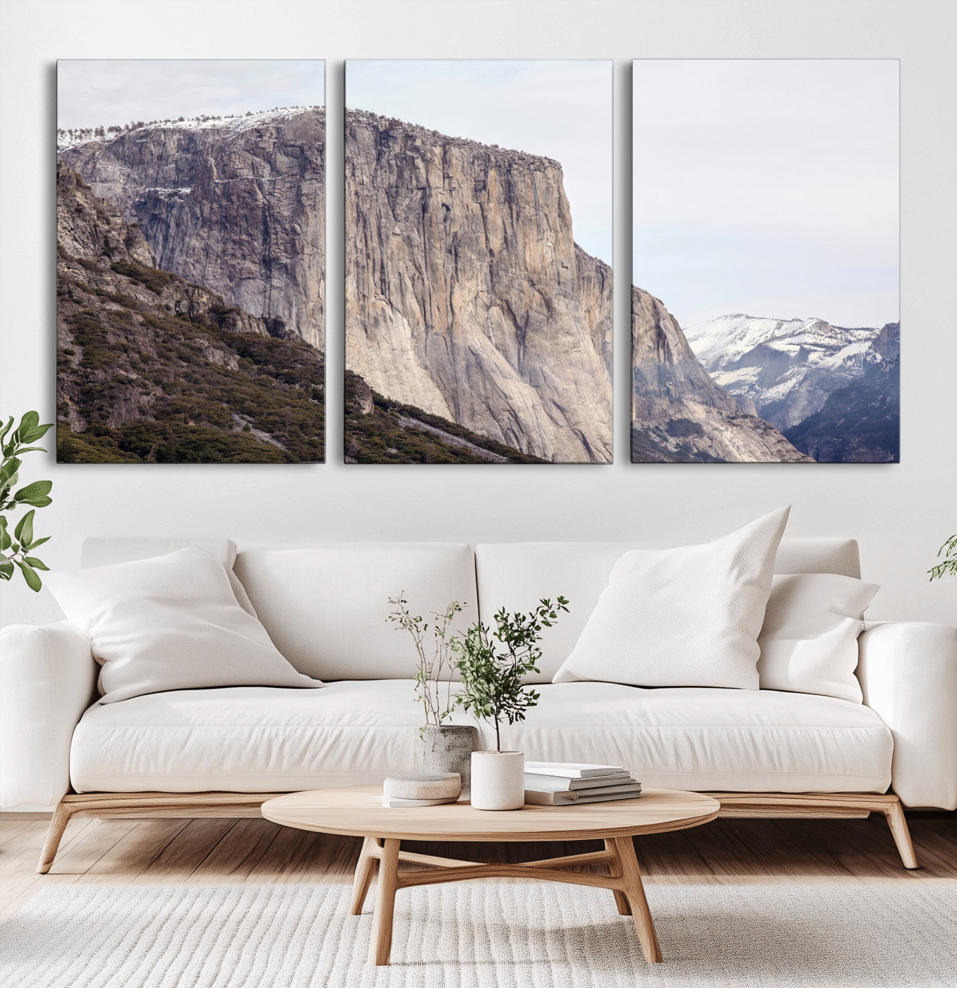 Framed canvas of El Capitan’s vertical granite face in Yosemite with snowy peaks, ideal for Sierra minimalism or mountain-inspired decor.