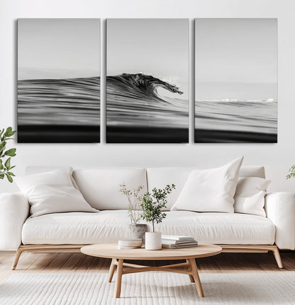 Striking black and white photo of a curling wave, ideal for modern coastal or minimalist wall decor settings.