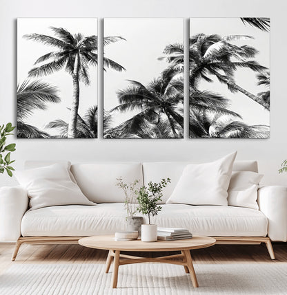 Black and white canvas of tall palm trees in moody tones, perfect for modern tropical minimalist or coastal-style home decor.