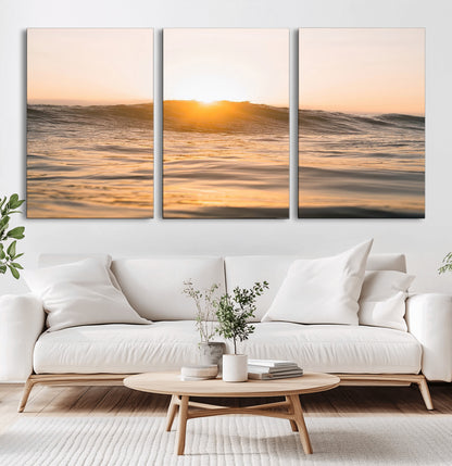 Ocean waves glowing under a warm golden sunset, reflecting soft light and calm movement, perfect for warm minimalist coastal interiors.