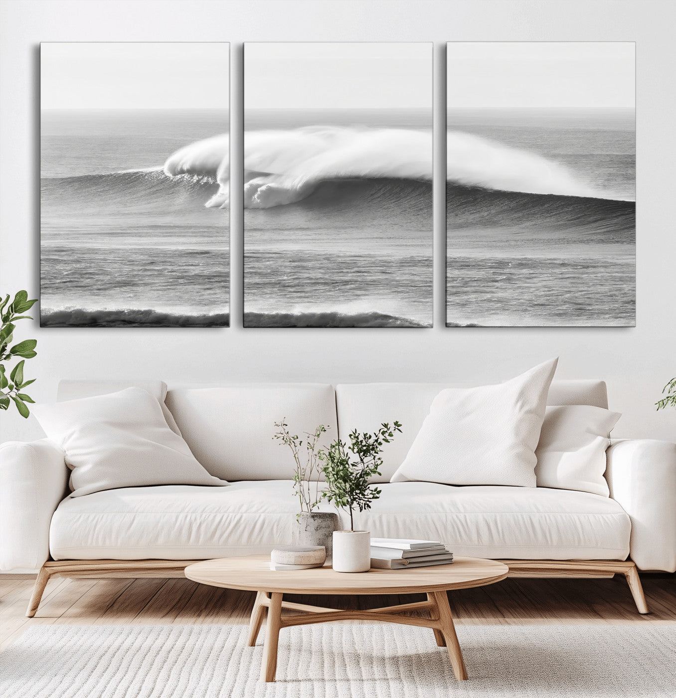 A dramatic black and white ocean wave crashing with immense force, capturing the raw power and movement of the sea in a bold seascape.