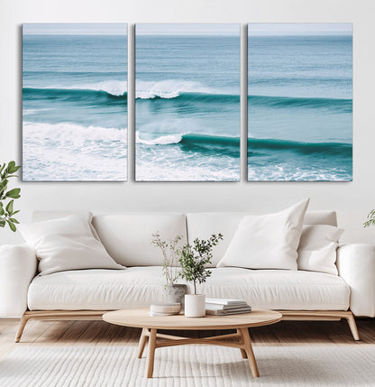 Powerful ocean waves rolling towards the shore, their turquoise hues blending with white sea foam under an open horizon, capturing the essence of the ocean's movement.