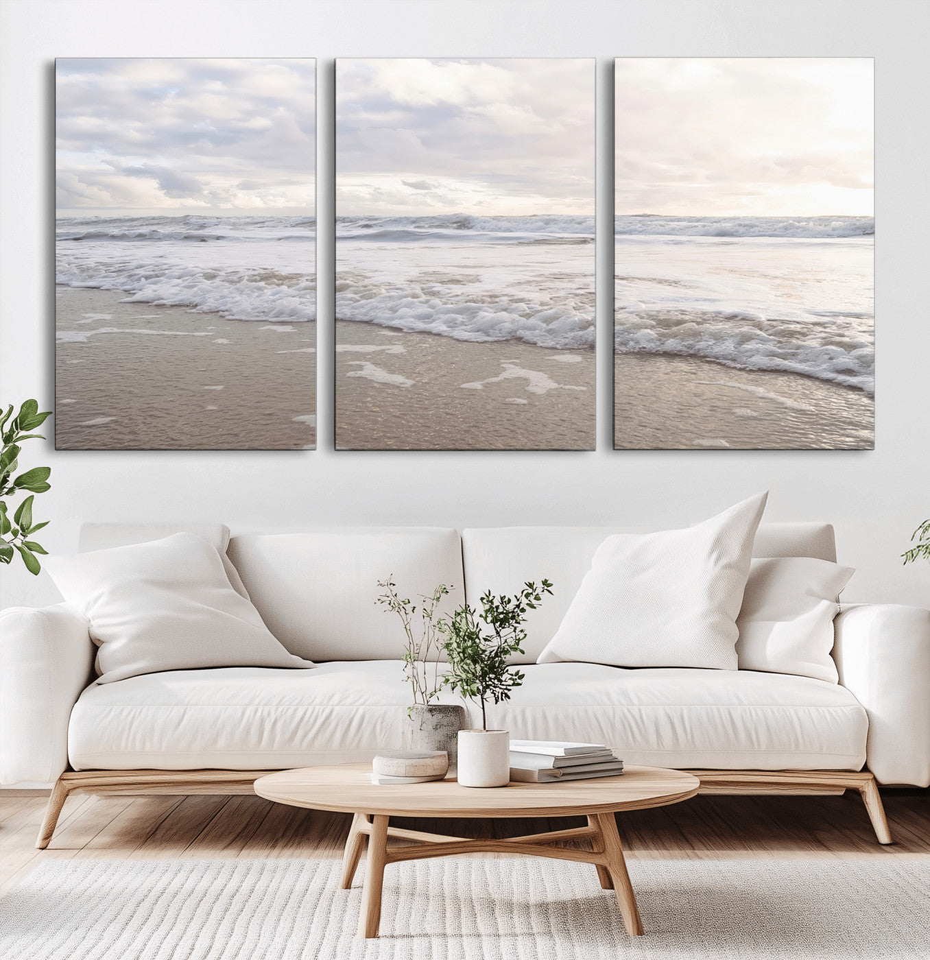 Peaceful ocean waves rolling onto the sandy shore under soft light, perfect for neutral or coastal minimalist decor themes.