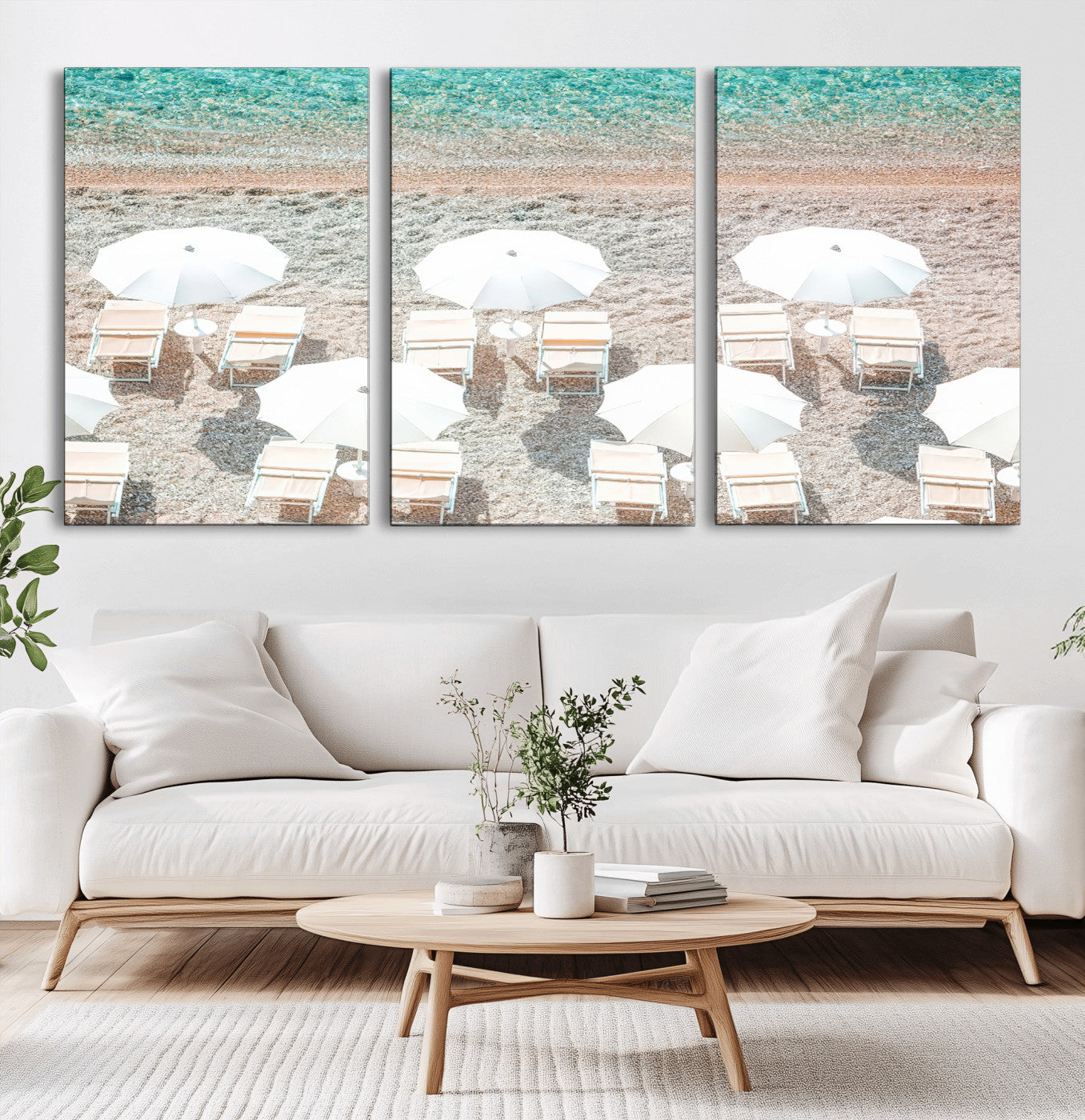 A bright beach scene with white umbrellas, pastel sand, and turquoise waters, creating a tranquil coastal vibe, perfect for beach house or summer decor.