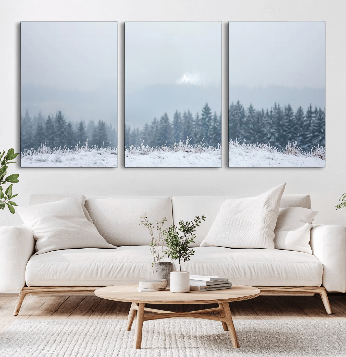 Snow-covered forest under misty sky, soft light breaking through clouds, ideal for minimalist or Nordic-inspired home decor.