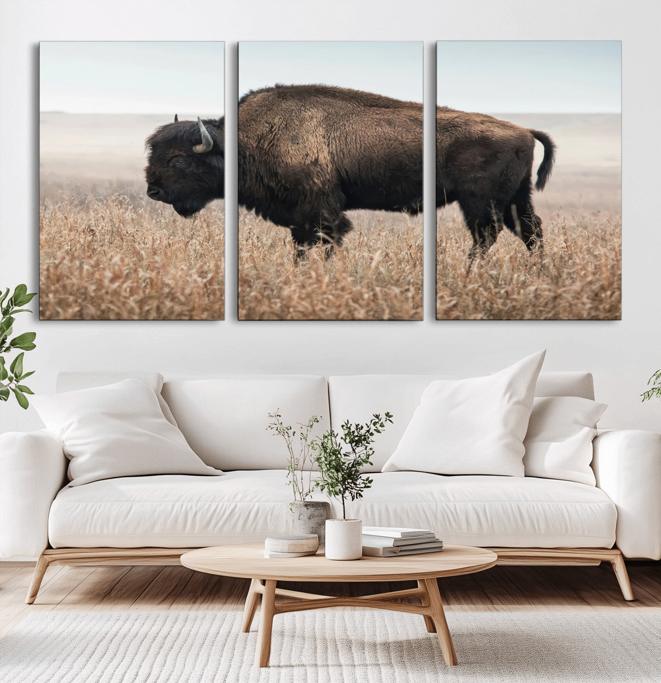 A lone bison stands in a vast prairie under a soft sky, evoking freedom and rustic charm for western or farmhouse inspired interiors.