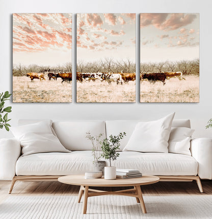 Cattle herd in a soft-toned field under a pastel pink sky, creating a peaceful rustic feel, perfect for farmhouse or western-themed spaces.