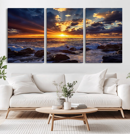 An explosive sunset over the ocean with dramatic clouds and rays of sunlight reflecting off the water, creating a vibrant and captivating view.