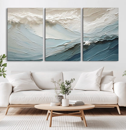 Textured canvas of ocean waves in soft coastal blues and creamy whites, ideal for modern or minimalist coastal-style interiors.
